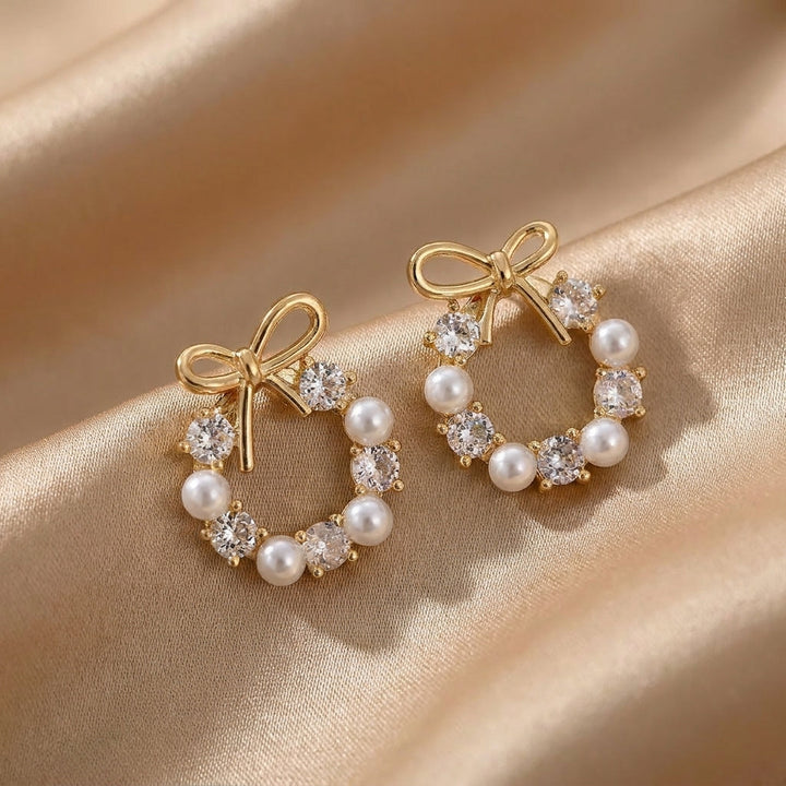 Fülbevalók masnival, glóriával és gyöngyökkel